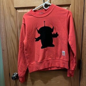 Red Sweatshirt with Black Alien Design